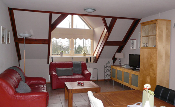 Living room in an apartment at De Visotter holiday park/