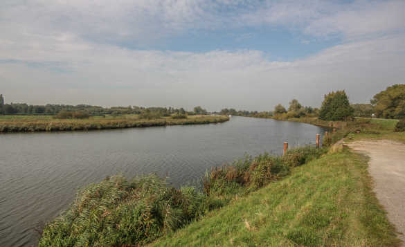 Canal flowing through countryside in South Holland/