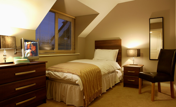 Bedroom with single bed at Lee Valley Golf Club/