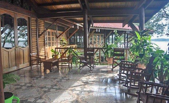 Outside seating area with tiled floor at Rio Indio Ecolodge, Nicaragua/
