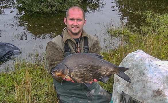 Angler holding a bream caught in Co Cavan/