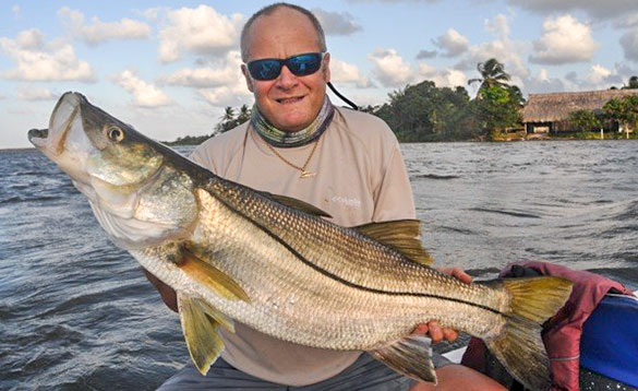 Angler holding a large snook caught in Nicaragua/