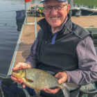 Angler holding a hybrid fish