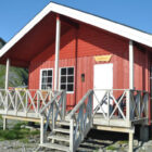 Red cabin with white decked area