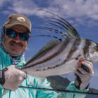 Angler holding a roosterfish