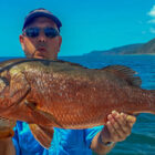 Angler holding a cubera snapper